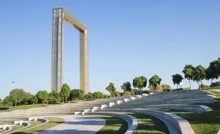 Luxury SUV driving through Dubai skyline